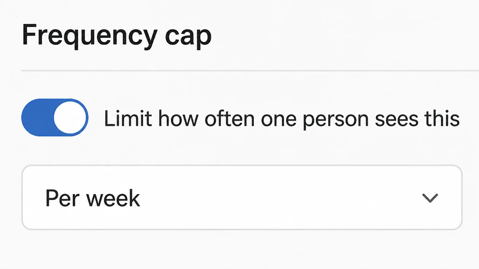 A campaign settings page headed Frequency cap, with a toggle switched on beside a label about limiting how often one person sees the advert