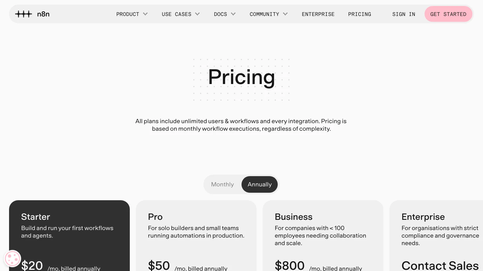 Screenshot of n8n's pricing page showing plans priced per month with unlimited users and workflows