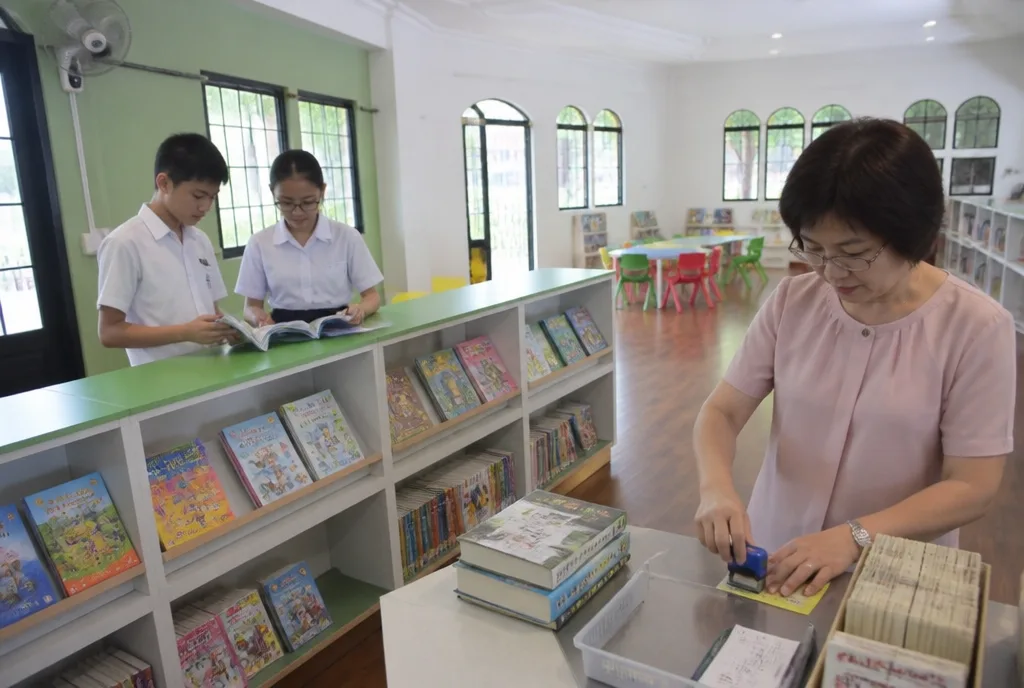 Choosing books for Monday in the school library.