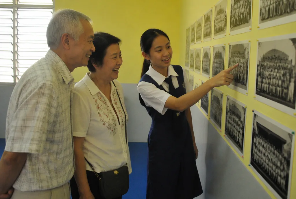 Alumni from the 1960s find themselves in the old class photographs.