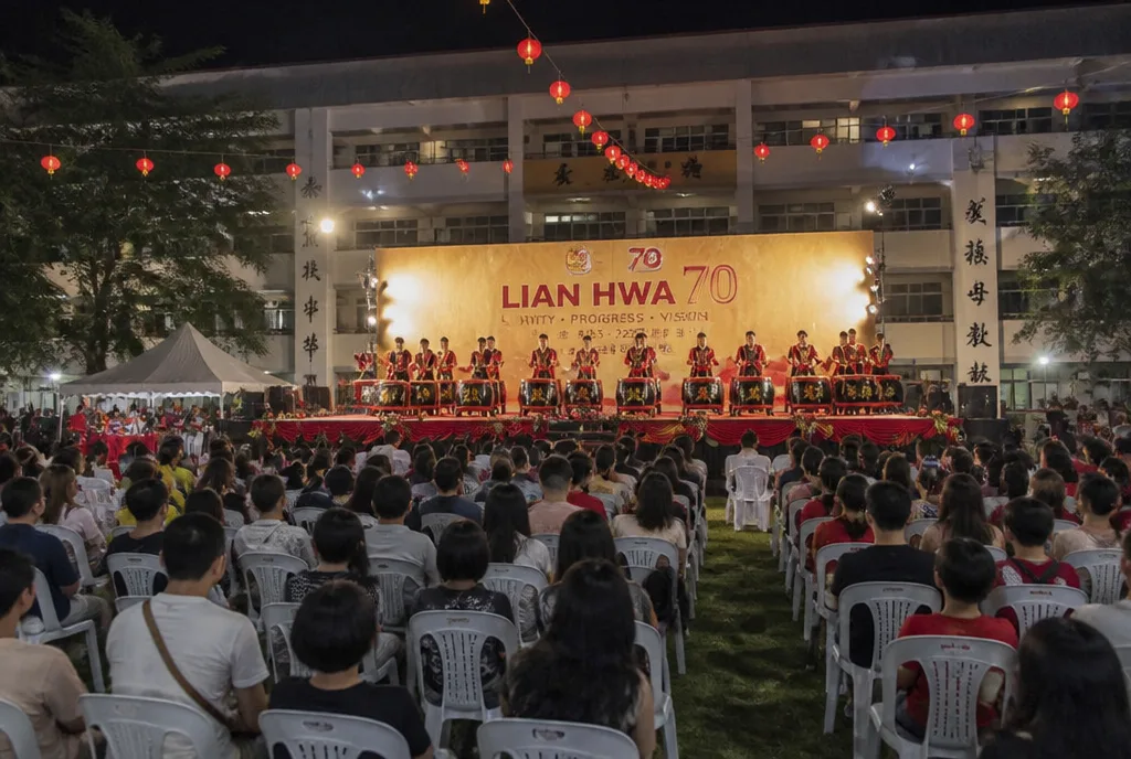 The 24 Festive Drums troupe opens the anniversary night on the school field.