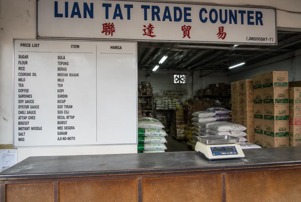 The Lian Tat trade counter with a printed price board