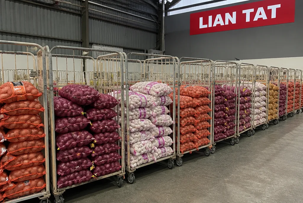 Roll cages of sacks ready for picking