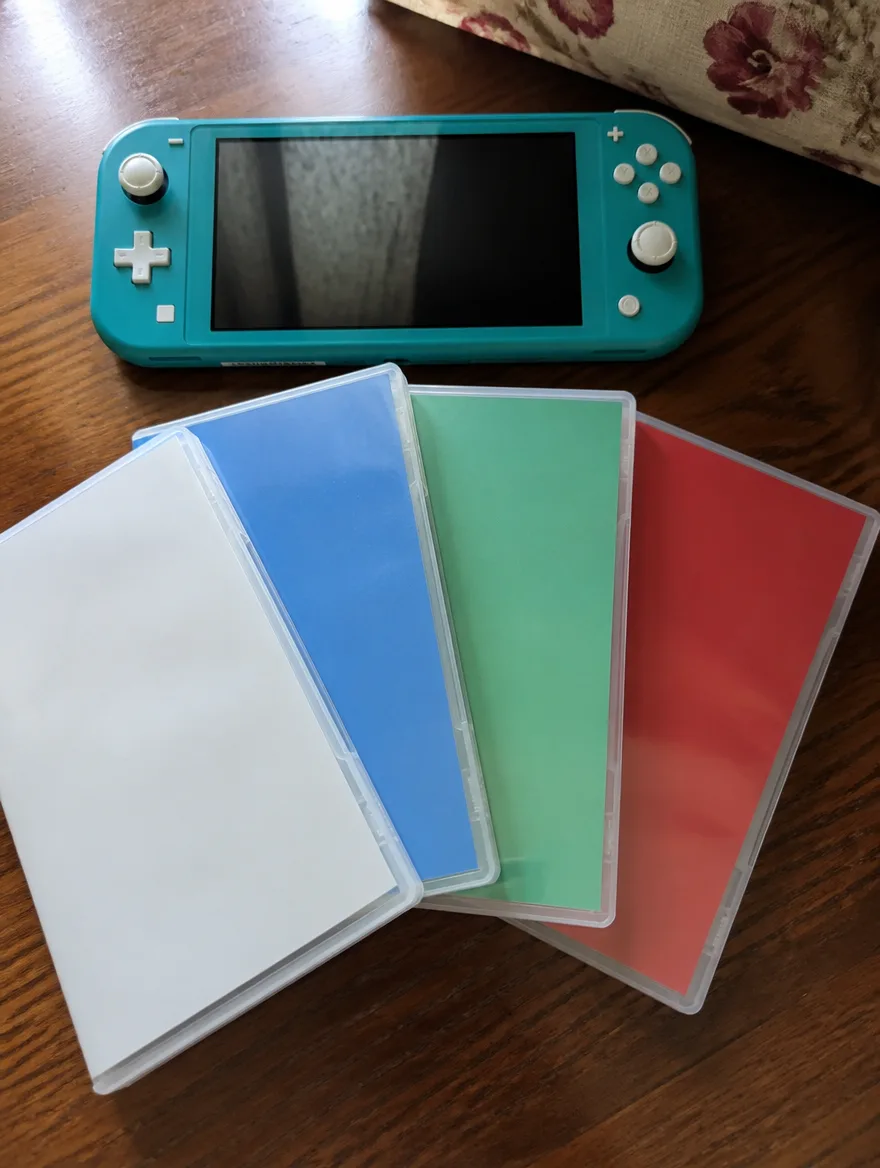Nintendo Switch Lite Turquoise + 4 games