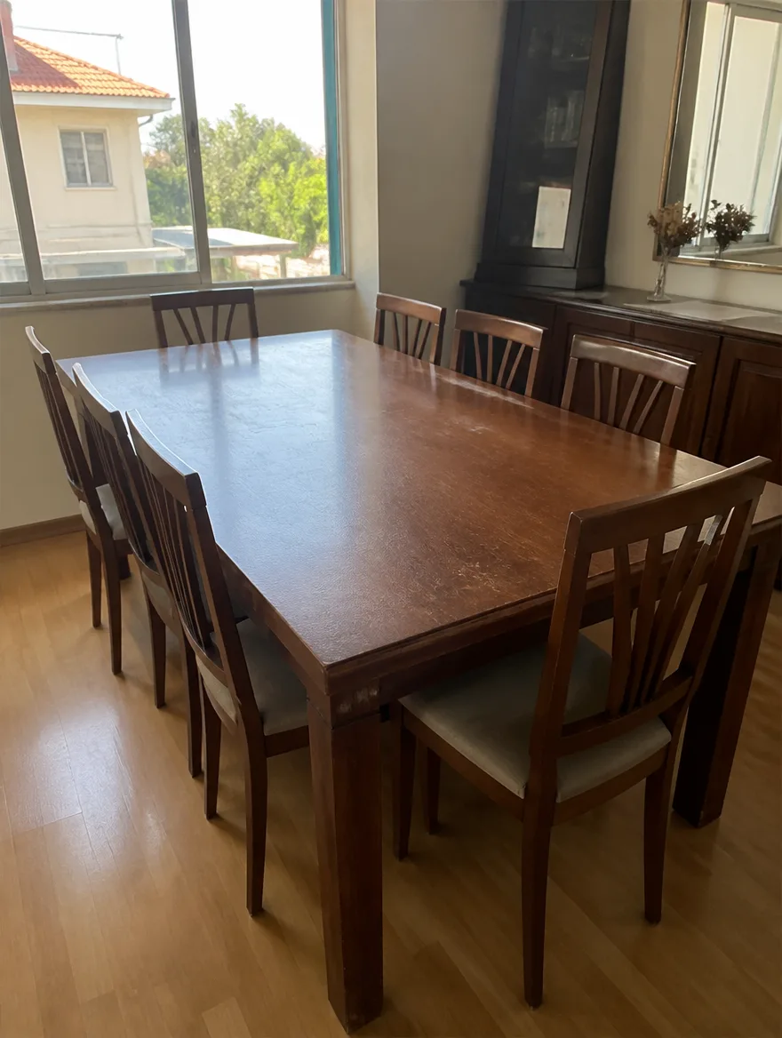 Wooden dining table with 8 chairs