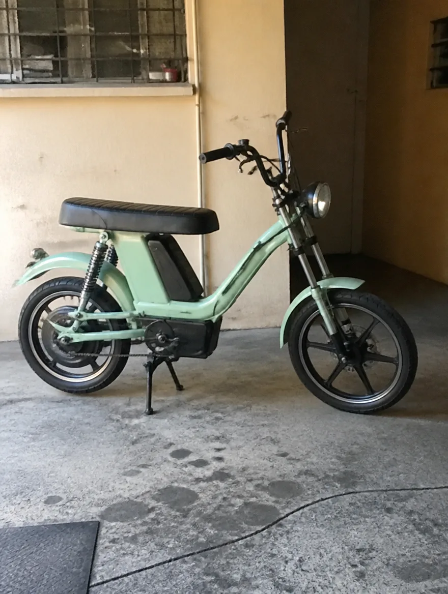 Retro electric motorcycle, mint green
