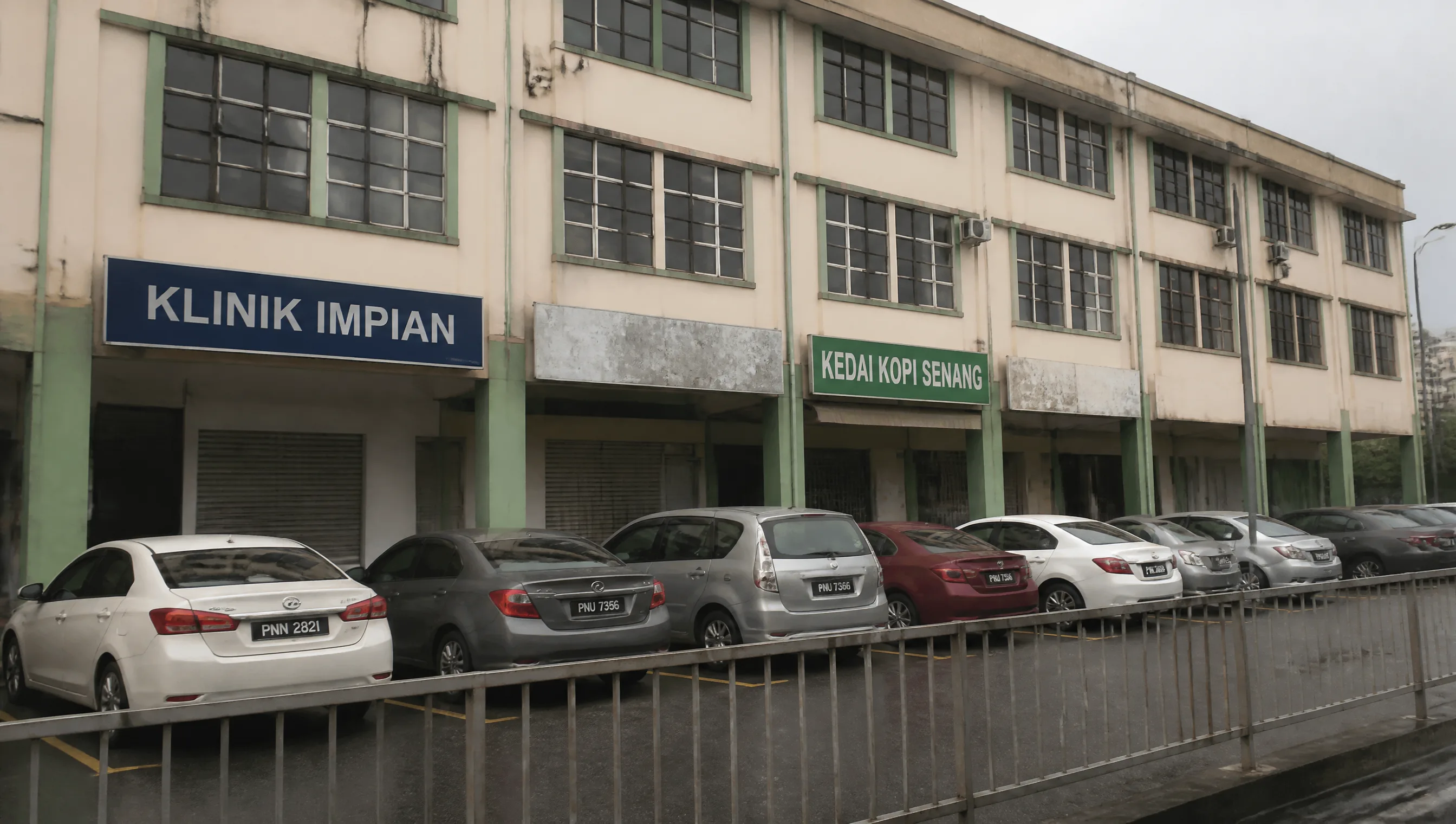 A row of three-storey commercial shoplots with covered walkways