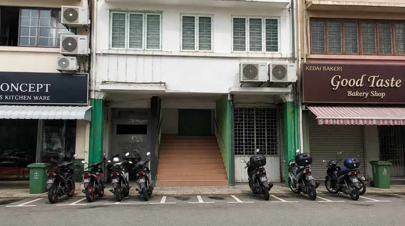 The five-foot-way frontage of a Pulau Tikus shoplot with a staircase to the offices above