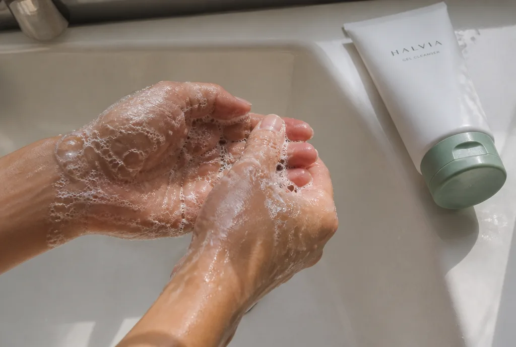Hands working Gel Cleanser into a lather