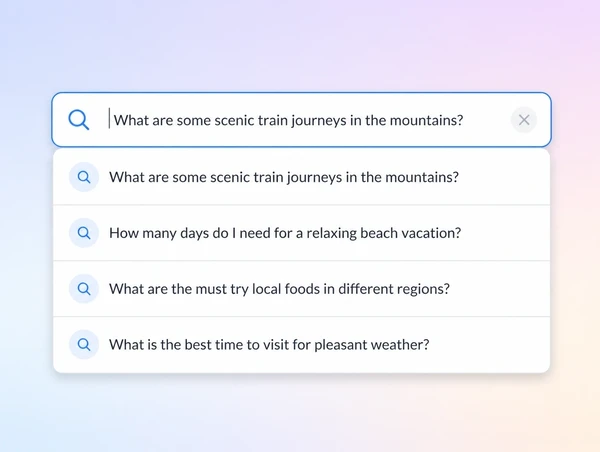 A search box with a list of suggested trip planning questions dropping down beneath it