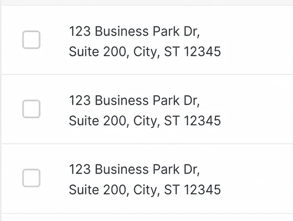 The same business address written consistently across several listings