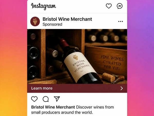 A sponsored wine merchant post in the Instagram feed with a learn more bar