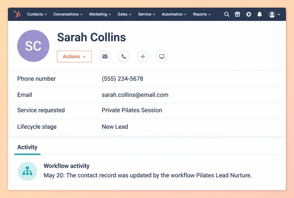 A HubSpot contact record for a pilates studio customer with four fields filled by a workflow