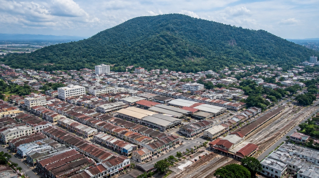 An overview of Bukit Mertajam town on the Penang mainland with the shophouse grid and the hill behind