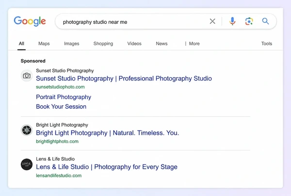 A Google results page with one sponsored photography studio advert above two organic results
