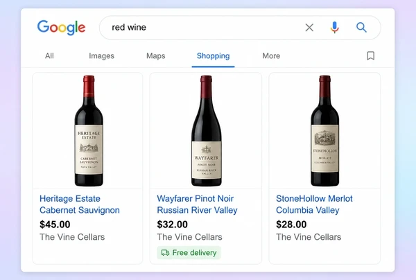 Three wine merchant product cards with photograph, title and price in Google Shopping