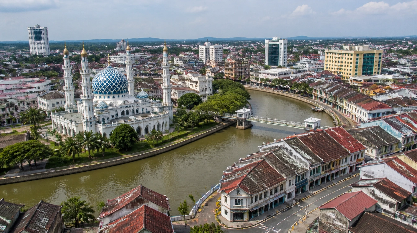 An overview of Klang town centre in Selangor with the royal mosque, the river and the old shophouse streets