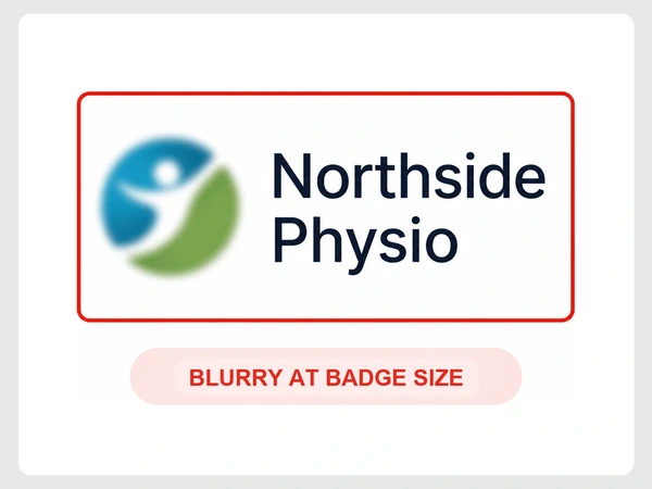 Northside Physio staff badge shows its small logo blurry and soft inside a red outline.