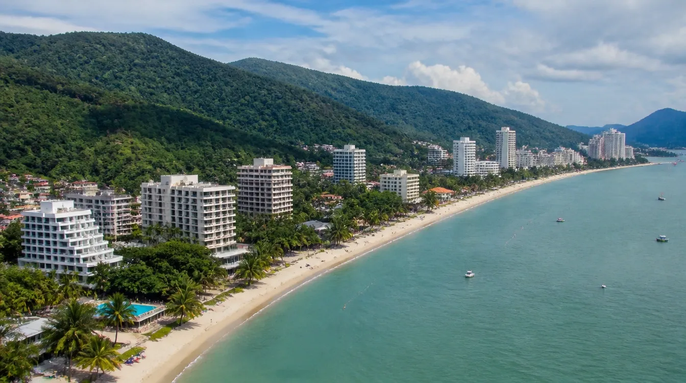 An overview of the Batu Ferringhi beach in Penang with resort hotels along the shore