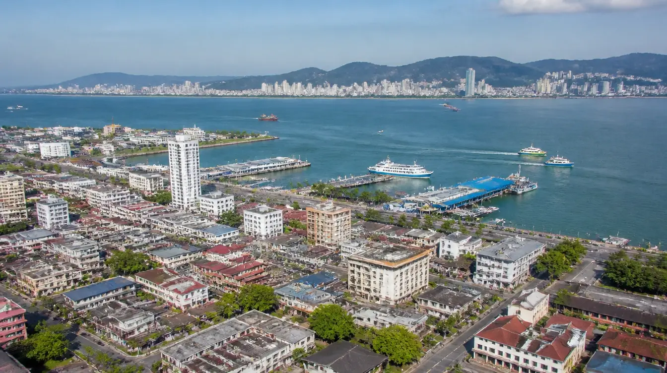 An overview of Butterworth on the Penang mainland with the ferry terminal and the channel