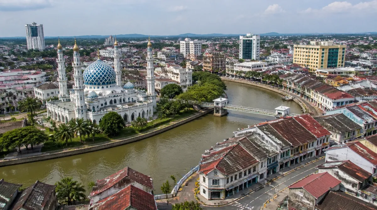 An overview of Klang town centre in Selangor with the royal mosque, the river and the old shophouse streets