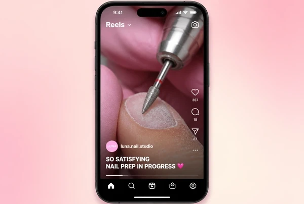 A vertical nail studio clip in Instagram Reels with large burned in captions