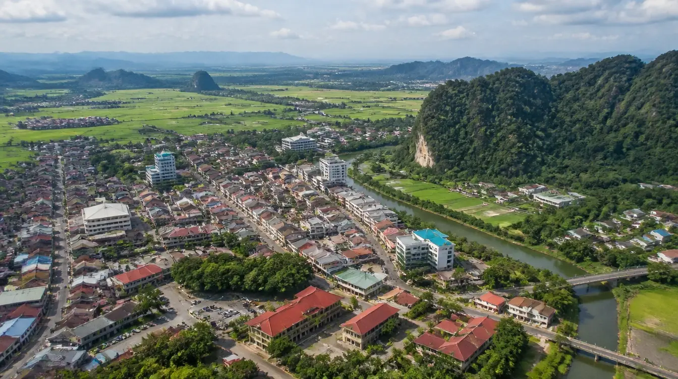 An overview of Kangar in Perlis with paddy fields and limestone hills around the town