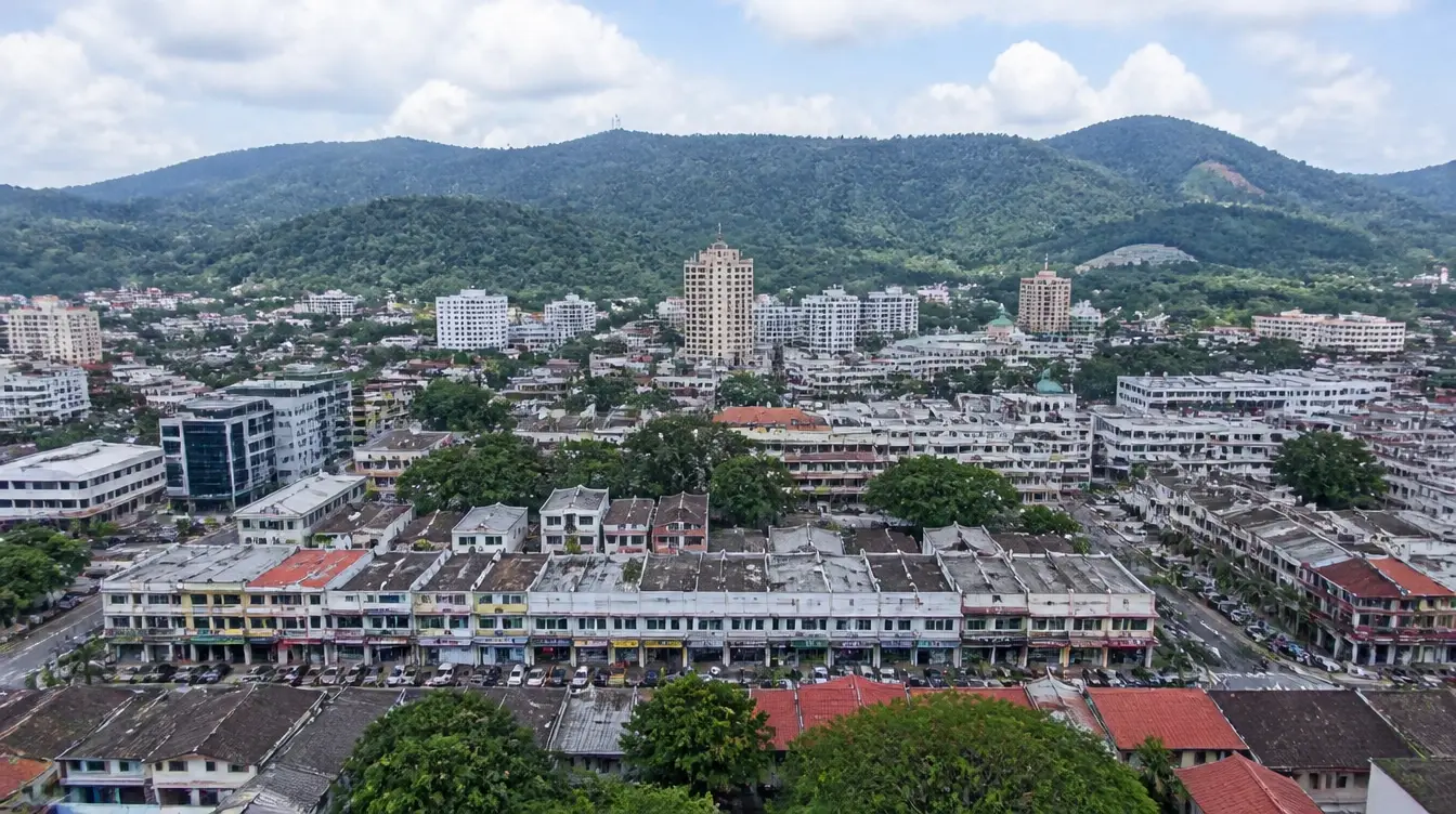 An overview of Seremban in Negeri Sembilan with the town centre below forested hills