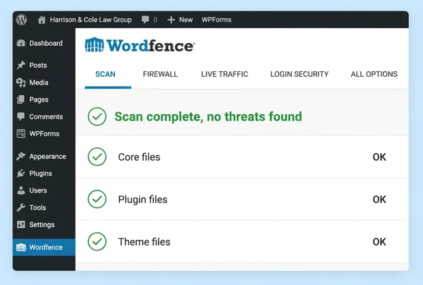 A Wordfence scan panel reporting no threats found with three groups of files checked